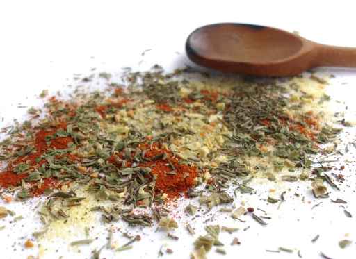  hearty Italian seasoning with a little cumin. Spices with a wooden spoon